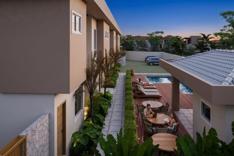 Deck lateral e área de convivência do Almare Mutá Residence