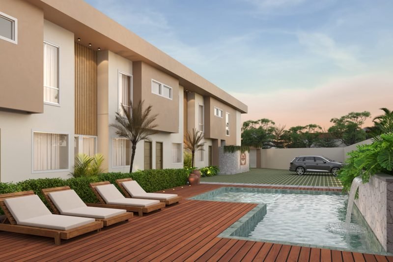 Deck e piscina do Almare Mutá Residence com espreguiçadeiras